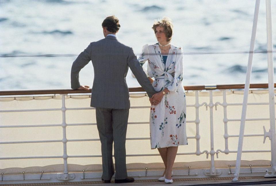 <p>Newlyweds Princess Diana and Prince Charles hold hands on the deck of the Royal Yacht Britannia on their honeymoon in 1981. The couple was leaving the port in Gibraltar to sail around the Mediterranean. </p>