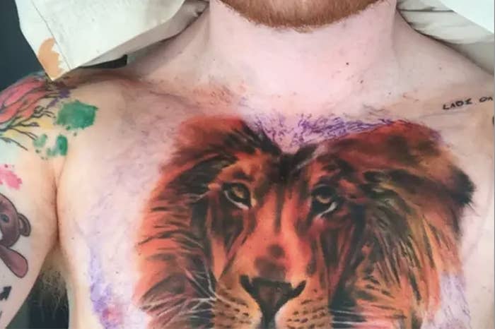 Lion tattoo on Ed's chest with a vibrant mane extending to shoulders