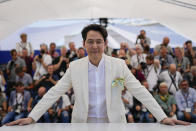 FILE - Lee Jung-jae poses for photographers at the photo call for the film 'Hunt' at the 75th international film festival, Cannes, southern France, Thursday, May 19, 2022. Star power has been out in force at the 75th Cannes Film Festival. After a 2021 edition muted by the pandemic, this year's French Riviera spectacular has again seen throngs of onlookers screaming out "Tom!" "Julia!" and "Viola!" The wattage on display on Cannes' red carpet has been brighter this year thanks the presence of stars like Tom Cruise, Julia Roberts, Viola Davis, Anne Hathaway, Idris Elba and others. But as the first half of the French Riviera spectacular has shown, stardom in Cannes is global. Just as much as cameras have focused on Hollywood stars, they've been trained on the likes of India's Aishwarya Rai and South Korea's Lee Jung-jae. (AP Photo/Daniel Cole, File)