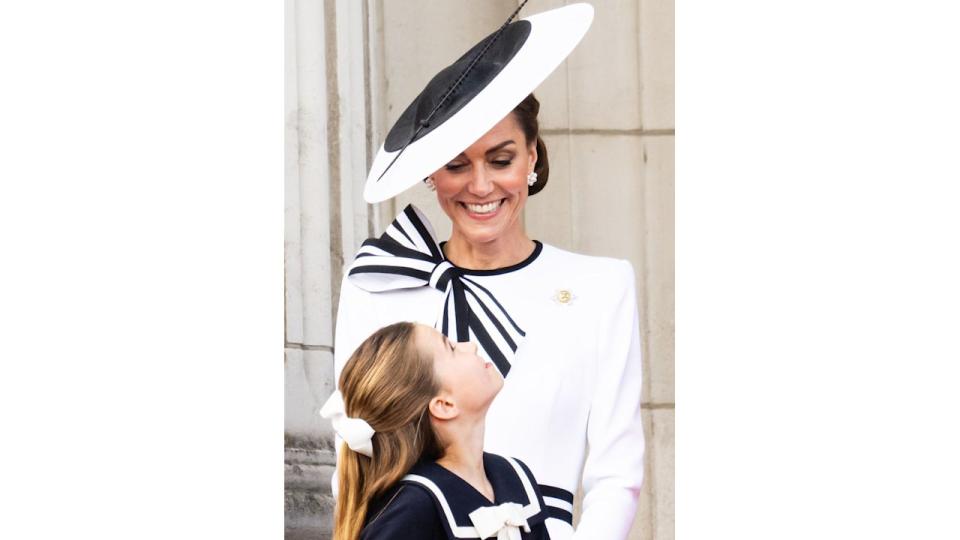 Princess Charlotte looking up at mum Kate Middleton