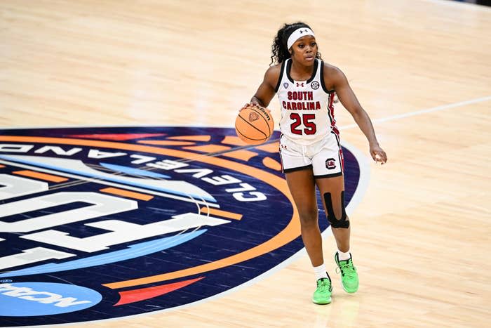 South Carolina basketball player number 25 Raven Clark dribbles the ball on the court during a game