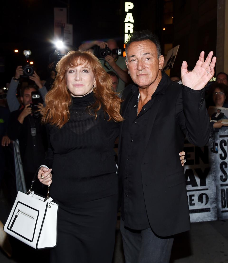 Musician Bruce Springsteen and his wife Patti Scialfa exit out the stage door after the "Springsteen On Broadway" opening night performance at the Walter Kerr Theatre on Thursday, Oct. 12, 2017, in New York. (Photo by Evan Agostini/Invision/AP) ORG XMIT: NYEA105