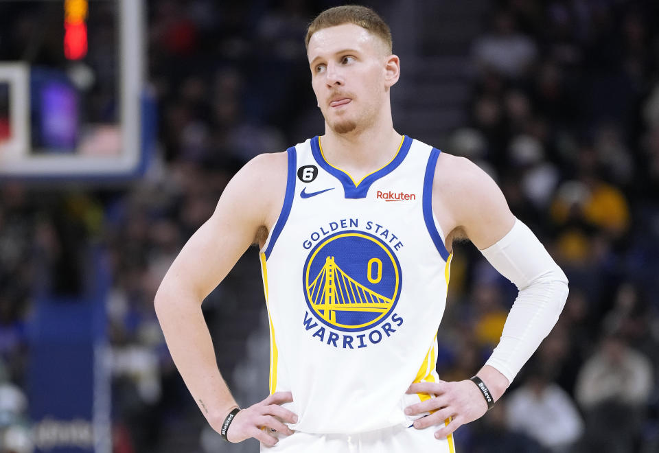 SAN FRANCISCO, CALIFORNIA - OCTOBER 11: Donte DiVincenzo #0 of the Golden State Warriors looks on against the Portland Trail Blazers during the second quarter of an NBA basketball ga at Chase Center on October 11, 2022 in San Francisco, California. NOTE TO USER: User expressly acknowledges and agrees that, by downloading and or using this photograph, User is consenting to the terms and conditions of the Getty Images License Agreement. (Photo by Thearon W. Henderson/Getty Images)