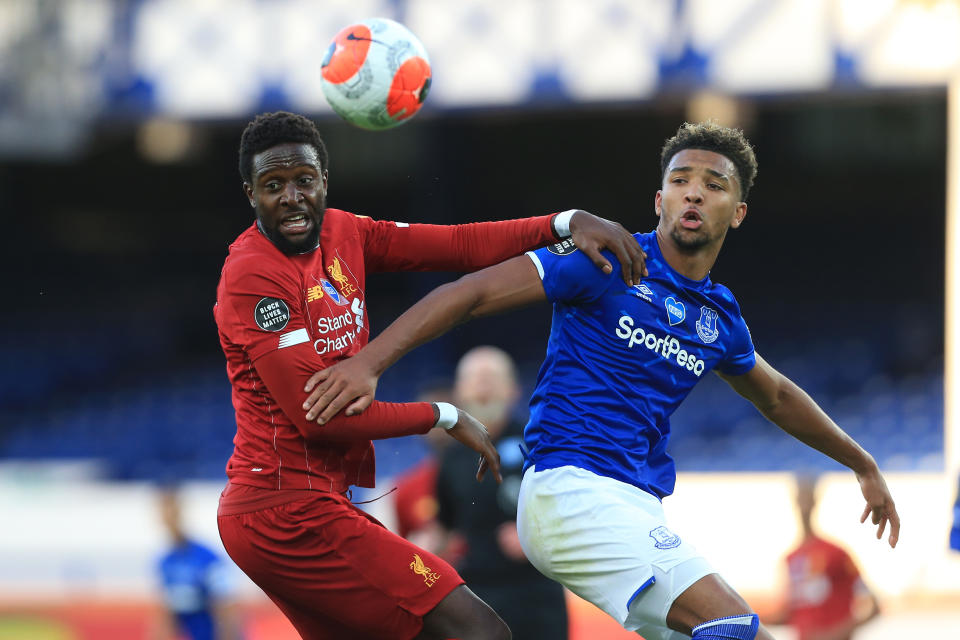 Neither Liverpool's Divock Origi nor Everton's Mason Holgate could find a goal in the Merseyside derby, to say nothing of both sides entirely. (Photo by Simon Stacpoole/Offside/Offside via Getty Images)