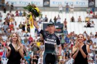 Cycling - The 104th Tour de France cycling race - The 22.5-km individual time trial Stage 20 from Marseille to Marseille, France - July 22, 2017 - Bora-Hansgrohe rider Maciej Bodnar of Poland celebrates his win on the podium. REUTERS/Benoit Tessier