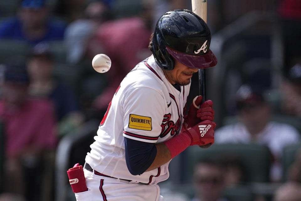 Atlanta Braves' Nicky Lopez is hit by a pitch in the third inning of a baseball game against the Washington Nationals, Sunday, Oct. 1, 2023, in Atlanta. (AP Photo/John Bazemore)