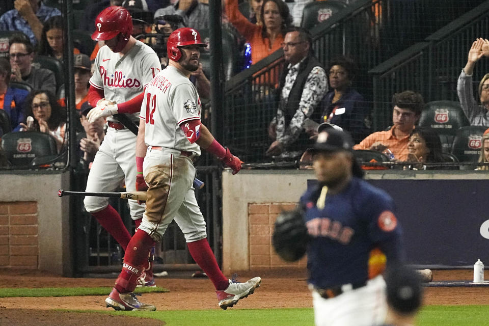 Philadelphia Phillies' Kyle Schwarber walks to the dugout after striking out during the third inning in Game 6 of baseball's World Series between the Houston Astros and the Philadelphia Phillies on Saturday, Nov. 5, 2022, in Houston. (AP Photo/Sue Ogrocki)