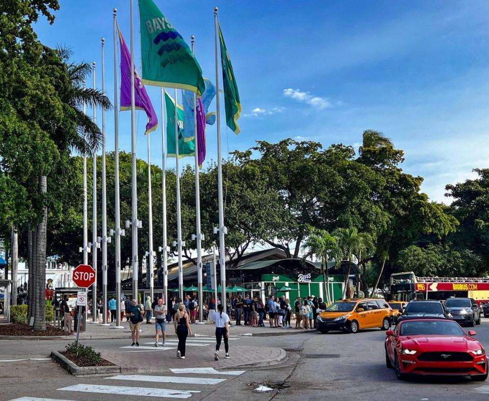 Tourists and visitors visit the popular destination after a night of chaos after fireworks were ignited and young adults descended causing some damage to businesses and loss of property on Tuesday, January 2, 2024.