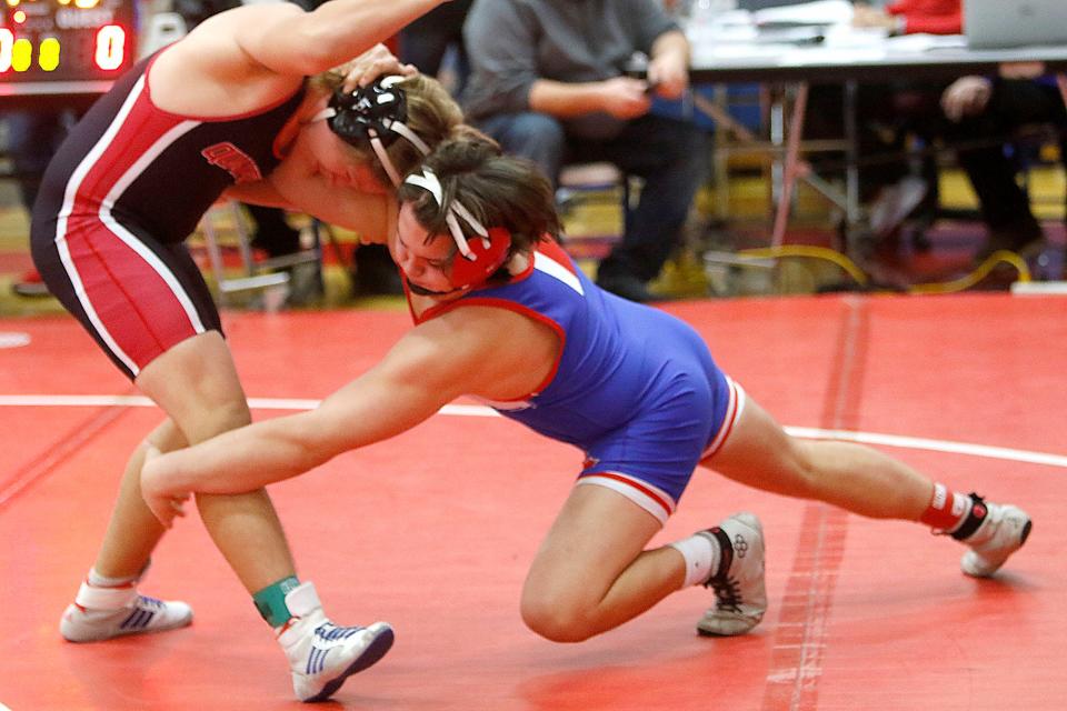 Mapleton High School's Grady Kline wrestles New Philadelphia High School's Nick Faber during the Dave Rohr Classic high school wrestling tournament on Saturday, Jan. 22, 2022 at Mapleton High School. TOM E. PUSKAR/TIMES-GAZETTE.COM