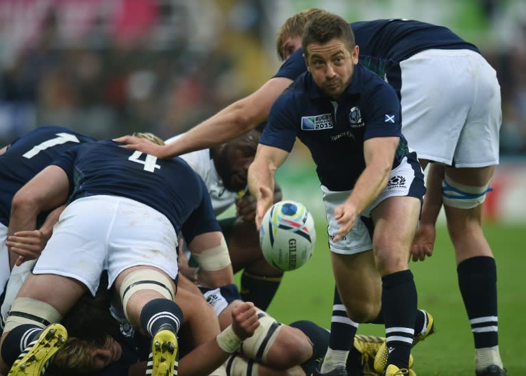 Scotland's scrum half and captain Greig Laidlaw passes the ball during a Pool B match in the 2015 Rugby World Cup against South Africa at St James' Park on October 3, 2015 AFP PHOTO / PAUL ELLIS RESTRICTED TO EDITORIAL USE, NO USE IN LIVE MATCH TRACKING SERVICES, TO BE USED AS NON-SEQUENTIAL STILLS