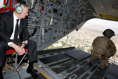 U.S. Defense Secretary James Mattis looks out over Kabul as he arrives via helicopter at Resolute Support headquarters in Kabul, Afghanistan April 24, 2017. REUTERS/Jonathan Ernst