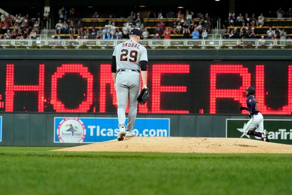 Detroit Tigers pitcher Tarik Skubal (29) reacts as Minnesota Twins' Byron Buxton, back right, rounds the bases on a solo home run off Skubal in the first inning Thursday, Sept. 30, 2021, in Minneapolis.