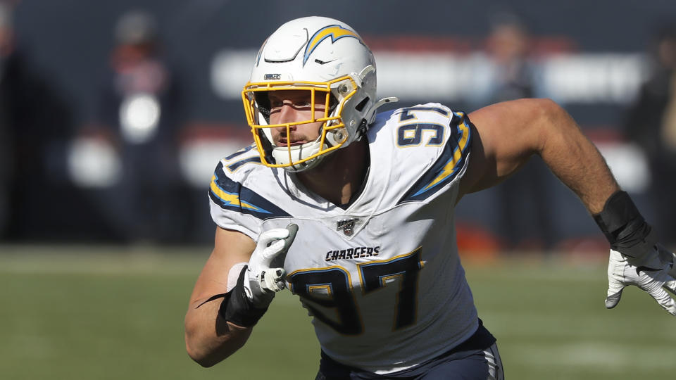 Joey Bosa rushes the quarterback.