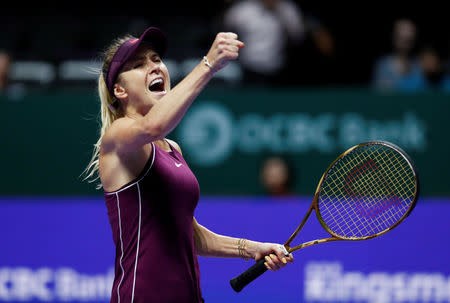 Tennis - WTA Tour Finals - Singapore Indoor Stadium, Kallang, Singapore - October 23, 2018 Ukraine's Elina Svitolina celebrates after winning her group stage match against Czech Republic's Karolina Pliskova REUTERS/Edgar Su