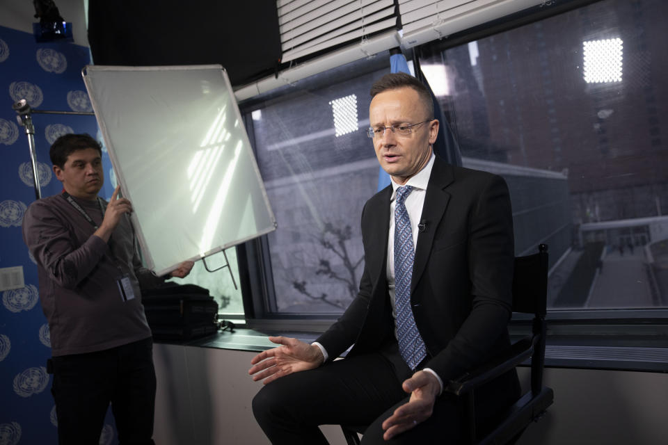 Peter Szijjarto, Minister of Foreign Affairs of Hungary, is interviewed by The Associated Press, Friday, March 24, 2023, at United Nations headquarters. Szijjarto said Friday that his country has not voted on whether to allow Finland and Sweden to join NATO because Hungarian lawmakers are sick of those countries' critiques of Hungarian domestic affairs. (AP Photo/John Minchillo)