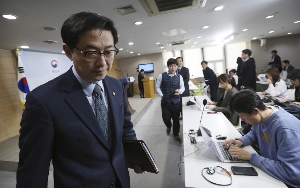 South Korean Vice Unification Minister Chun Hae-sung leaves after a press conference at the Unification Ministry in Seoul, South Korea, Friday, March 22, 2019. North Korea abruptly withdrew its staff from an inter-Korean liaison office in the North on Friday, Seoul officials said. (AP Photo/Ahn Young-joon)