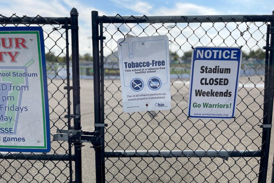 A sign on the gate of Charles Fredrick Stadium at Winton Woods High School, reads of “use of all tobacco products on school property is prohibited.”