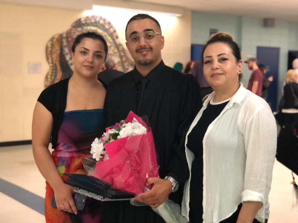Ferdos Rasuli's sister Athar Rasuli and mother Fahima Rasuli came to support him at his graduation from CDC Vimont. Ferdos Rasuli says his mother, a former university biology professor in Afghanistan, inspired him throughout his studies.