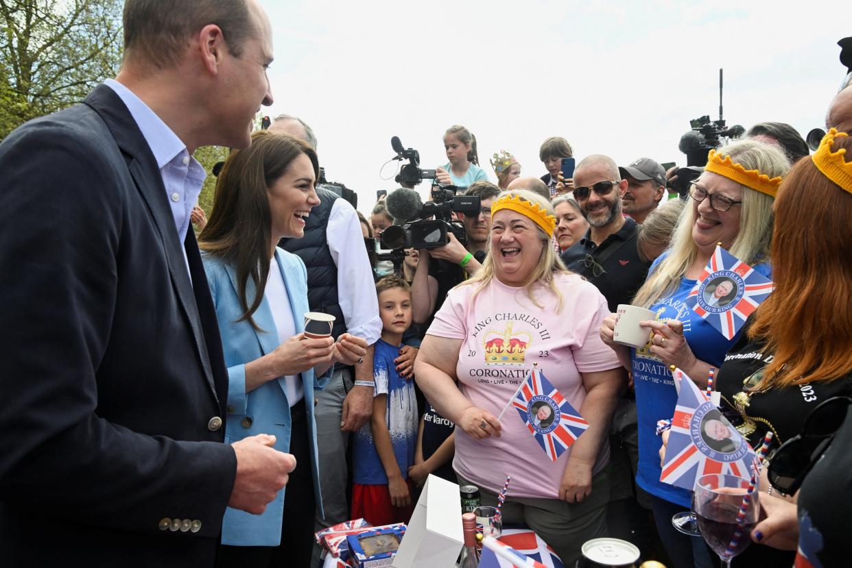 Royal couple try drinks on the Long Walk (Reuters)