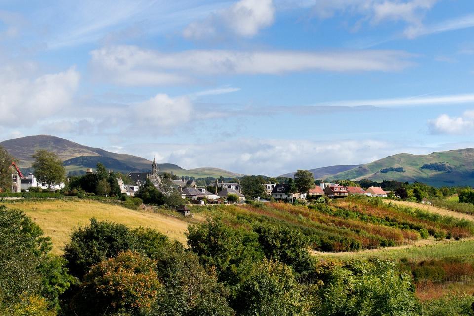 Roslin village home to Rosslyn Chapel in rolling landscape near Edinburgh Scotland UK