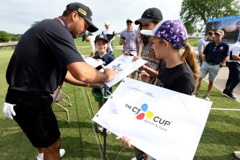 Defending champion Jason Day of Australia signs autographs before the US PGA Tour Byron Nelson tournament (Tim Heitman)