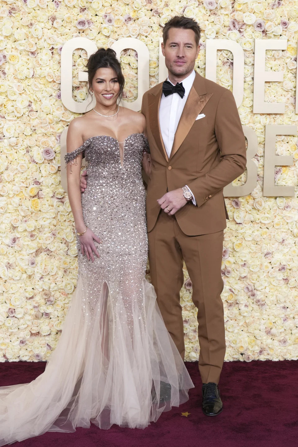 Sofia Pernas, left, and Justin Hartley arrive at the 81st Golden Globe Awards on Sunday, Jan. 7, 2024, at the Beverly Hilton in Beverly Hills, Calif. (Photo by Jordan Strauss/Invision/AP)