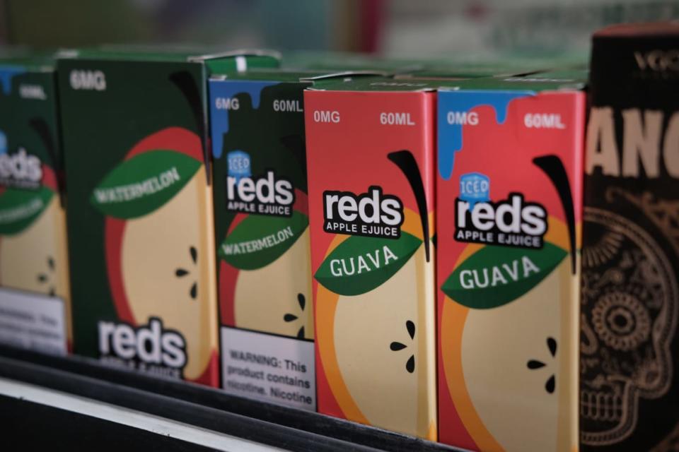 Vaping products, including flavored vape liquids and pods, are displayed at Gotham Vape in Queens, on September 17, 2019 in New York City. (Photo by Spencer Platt/Getty Images)