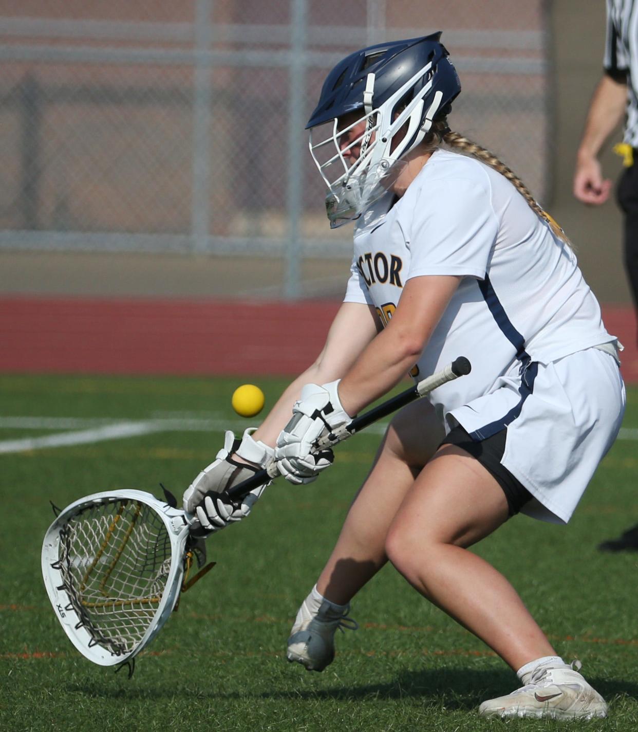 Victor goalie Maggie Allen makes a save against Irondequoit in 2023.