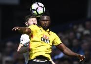 Britain Football Soccer - Tottenham Hotspur v Watford - Premier League - White Hart Lane - 8/4/17 Watford's Isaac Success in action with Tottenham's Ben Davies Reuters / Dylan Martinez Livepic