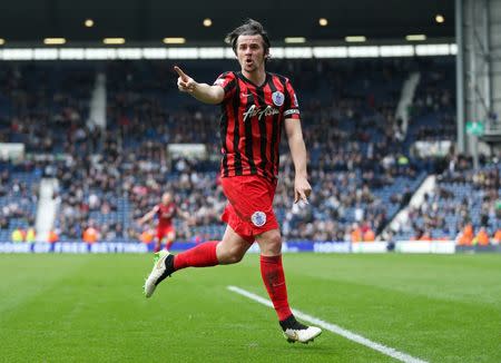 Joey Barton celebrates after scoring the fourth goal for QPR. Action Images/ Alex Morton