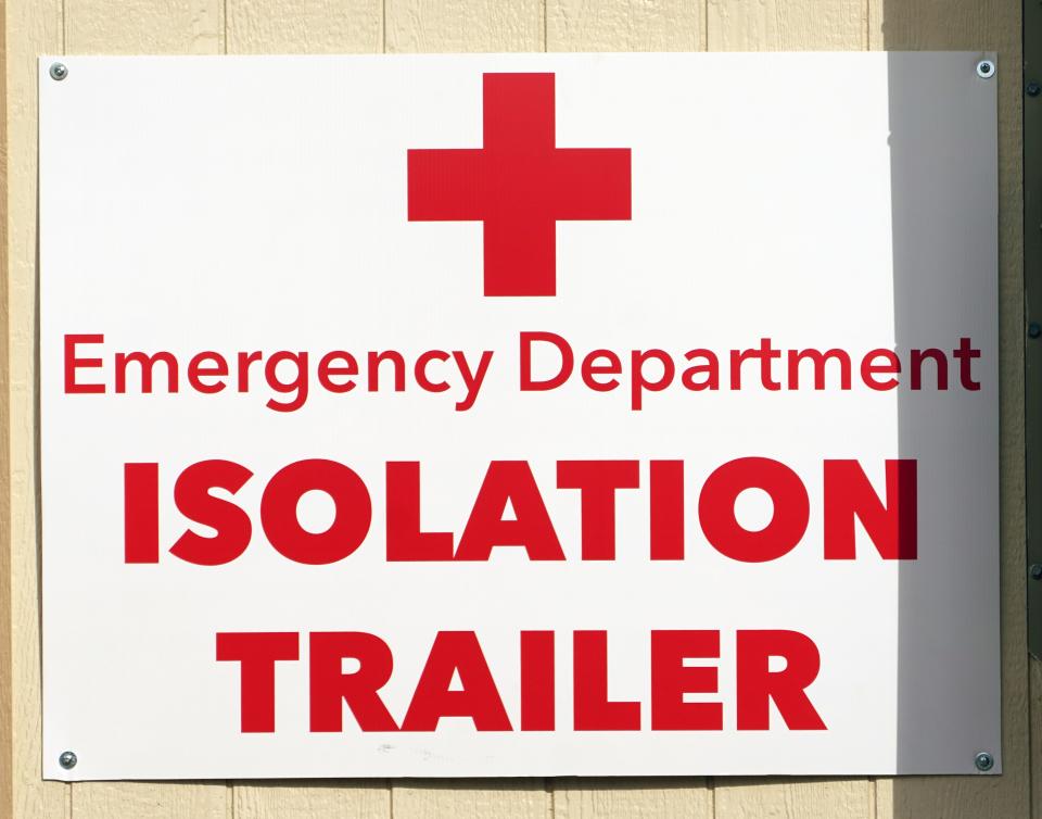 A sign at the Vail Health Hospital in Vail, Colorado, for the emergency department's coronavirus isolation trailer.