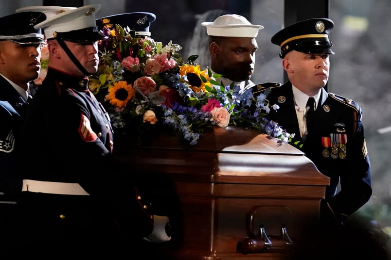 The casket of former first lady Rosalynn Carter is moved into place for a repose service in the lobby of the Jimmy Carter Presidential Library and Museum in Atlantaon November 27, 2023. (Photo by Brynn Anderson / POOL / AFP) (Photo by BRYNN ANDERSON/POOL/AFP via Getty Images)