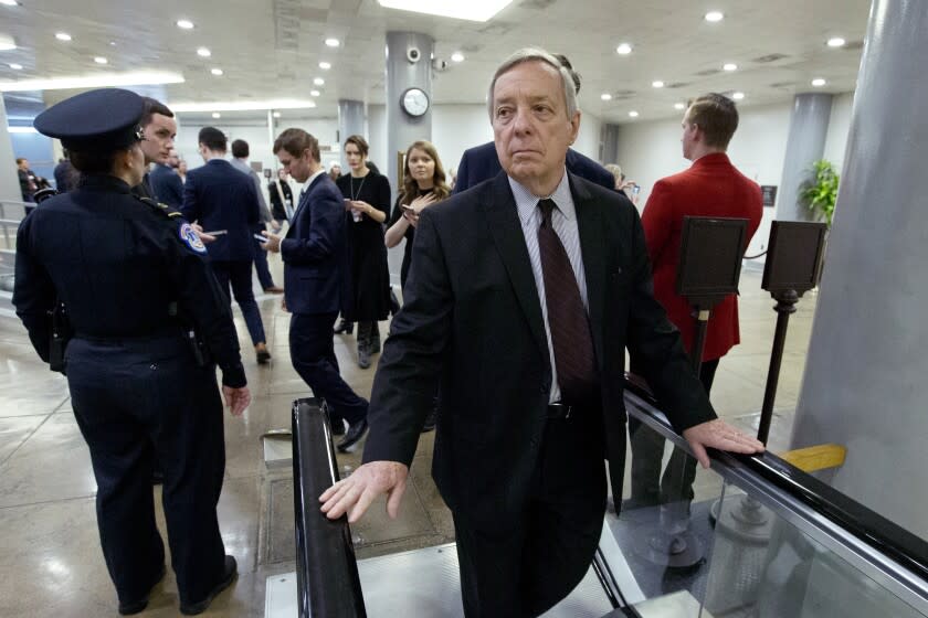 Sen. Dick Durbin, D-Ill., walks in the subway before attending the impeachment trial of President Donald Trump on charges of abuse of power and obstruction of Congress, Thursday, Jan. 23, 2020, on Capitol Hill in Washington. (AP Photo/Jose Luis Magana)