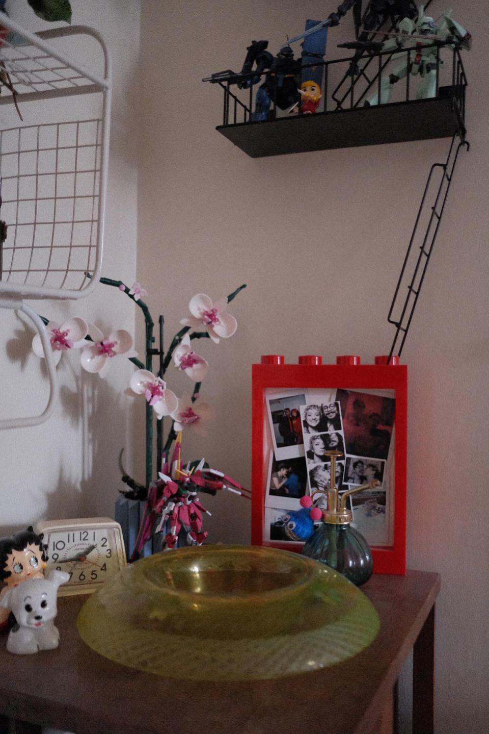 a vase with flowers on a table