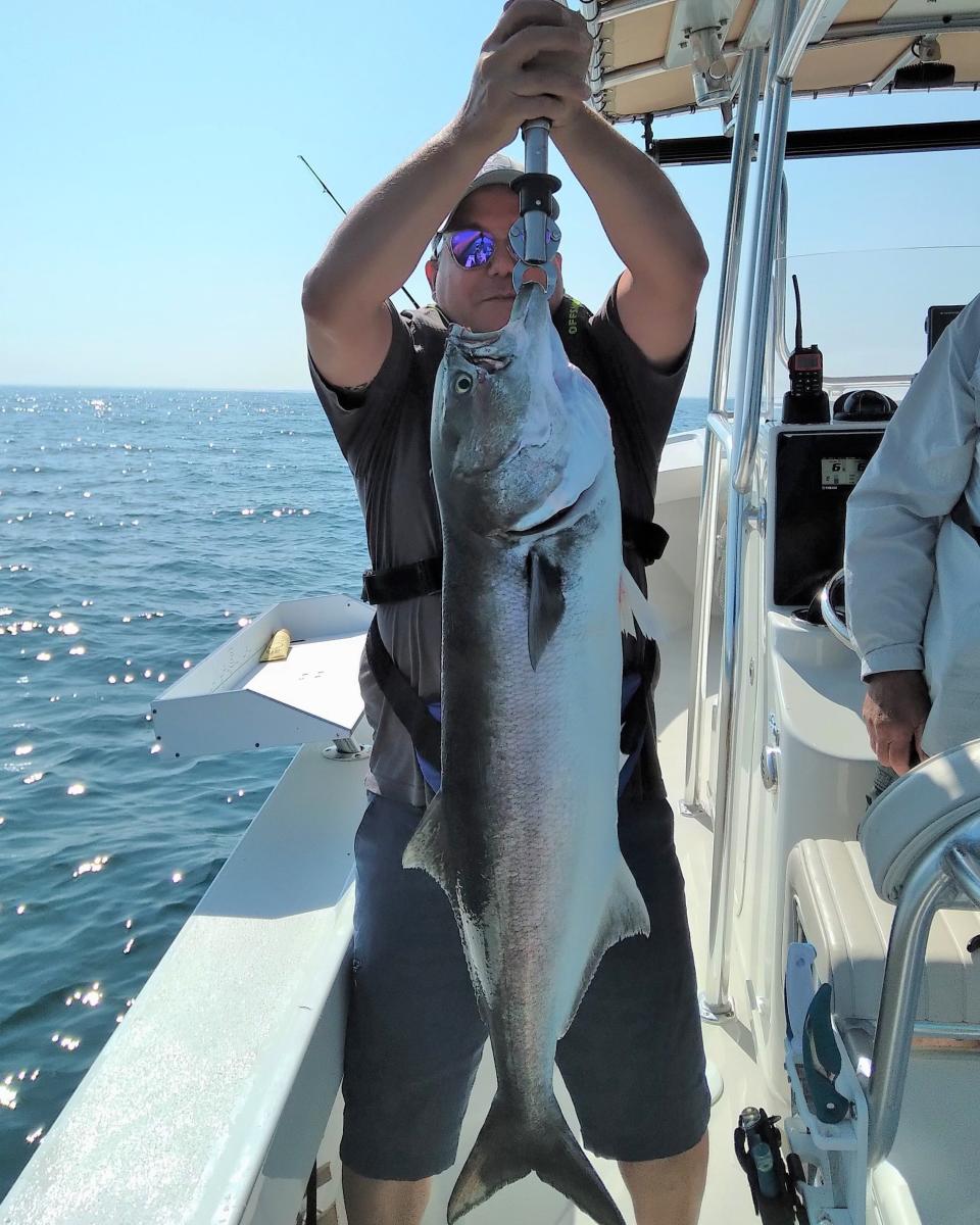 John O’Keefe of Jamestown with a 36-inch bluefish he caught and released that earned first place in the Block Island Inshore Fishing Tournament.