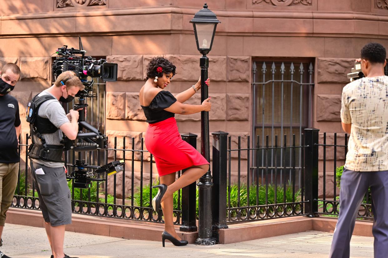 Remy Ma strikes a pose while filming on the set of "The Perfect Find" in Harlem on July 21, 2021, in New York City.