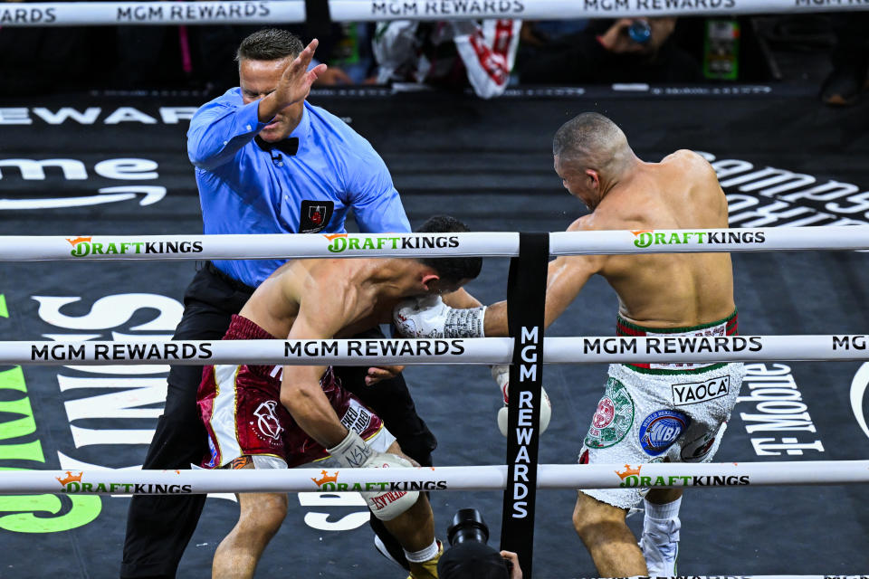 LAS VEGAS, NV - MARCH 30: Isaac Cruz ''Pitbull'' (in white short) knocked Rolando Romero ''Rolly'' (in burgundy short) out during their super lightweight world titles of the Premiere Boxing Championship on Saturday night at the T-Mobile Arena in Las Vegas, Nevada, United States on March 30, 2024. (Photo by Tayfun Coskun/Anadolu via Getty Images)