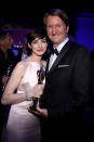 Anne Hathaway, winner of Best Actress award for her performance in 'Les Miserables' and director Tom Hooper attend the Oscars Governors Ball at Hollywood & Highland Center on February 24, 2013 in Hollywood, California.