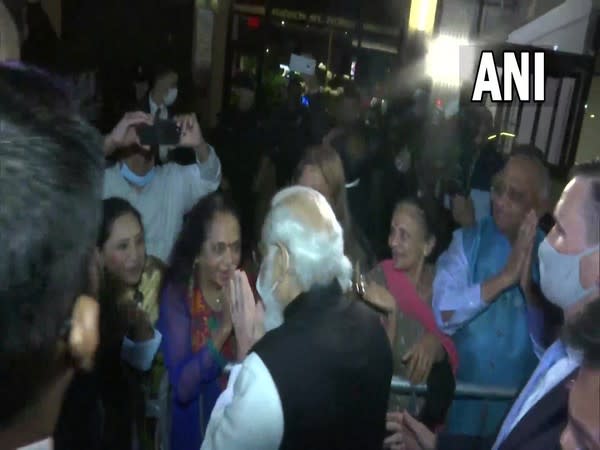 Prime Minister Narendra Modi greeting members of Indian Diaspora outside a hotel in New York. (Photo/ANI)