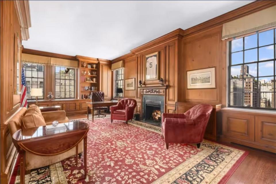 The library where the autographed Joe DiMaggio jersey hangs (Sotheby's International Realty - East Side Manhattan)
