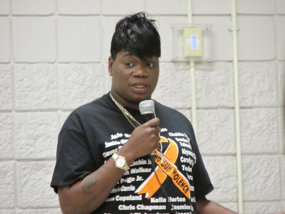 Demetria "Dee" Murphy speaks during a community forum discussion about gun violence Tuesday, June 7, 2022, at the Kiwanis Recreation Center in Fayetteville.