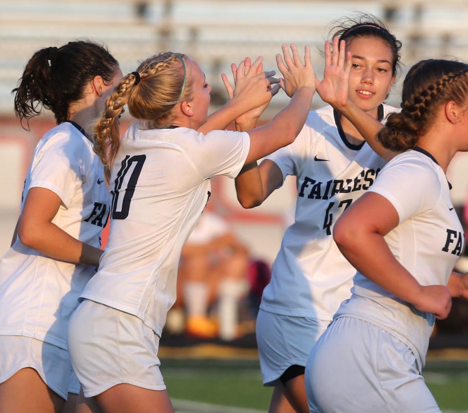 Fairless' Gracie Ashton (10) celebrates her goal with Cadyn McKelvey (47) during a game against Canton South last week.