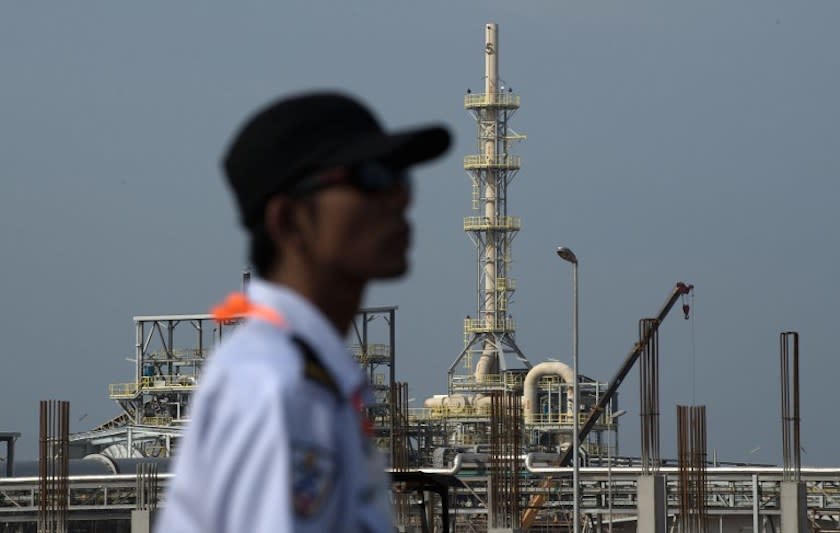 A security guard keeps vigil at an under-construction Lynas plant in Gebeng, some 270km east of Kuala Lumpur April 19, 2012. — AFP pic