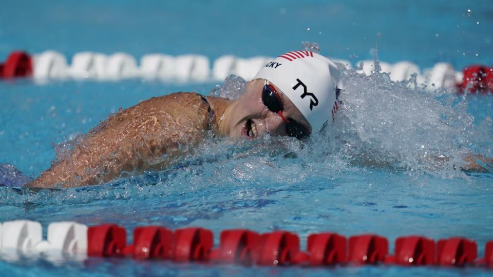 Katie Ledecky swims in a pool lane