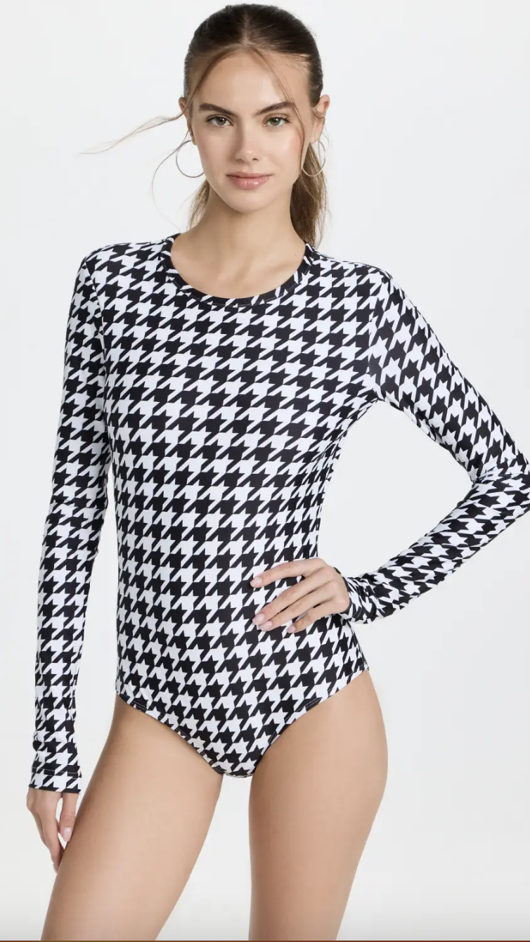 <p><a href="https://go.redirectingat.com?id=74968X1596630&url=https%3A%2F%2Fwww.shopbop.com%2Fhoundstooth-long-sleeve-swimsuit-cover%2Fvp%2Fv%3D1%2F1585968384.htm&sref=https%3A%2F%2Fwww.townandcountrymag.com%2Fstyle%2Ffashion-trends%2Fg39664968%2Flong-sleeve-swimsuits%2F" rel="nofollow noopener" target="_blank" data-ylk="slk:Shop Now;elm:context_link;itc:0;sec:content-canvas" class="link ">Shop Now</a></p><p>Long Sleeve Rash Guard Swimsuit</p><p>shopbop.com</p><p>$245.00</p>