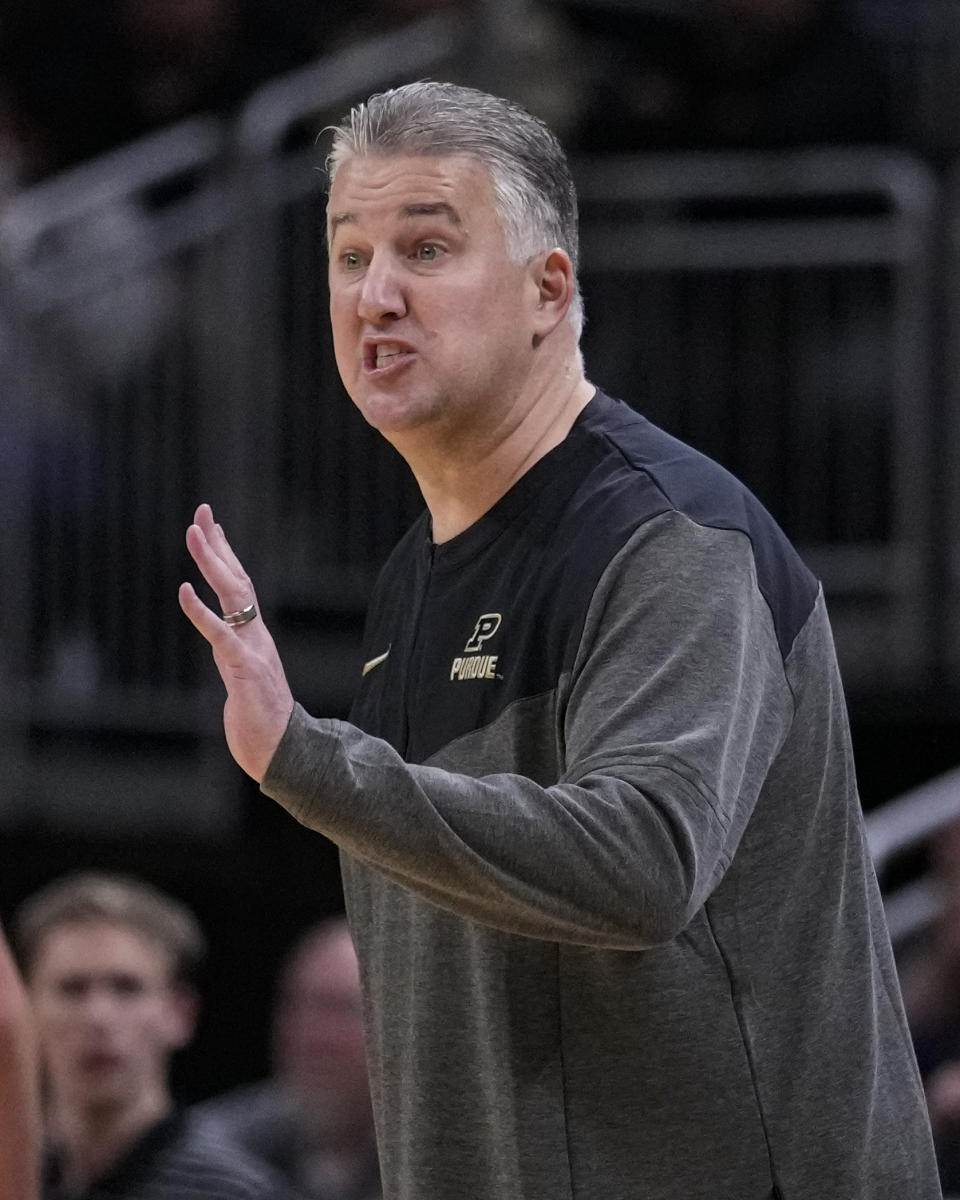 Purdue head coach Matt Painter yells to his team as they played against Davidson in the second half of an NCAA college basketball game in Indianapolis, Saturday, Dec. 17, 2022. (AP Photo/Michael Conroy)