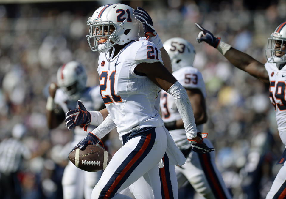 Virginia's Juan Thornhill (21) celebrates his interception against Connecticut in the second half of an NCAA college football game at Pratt & Whitney Stadium at Rentschler Field, Saturday, Sept. 17, 2016, in East Hartford, Conn. (AP Photo/Jessica Hill)