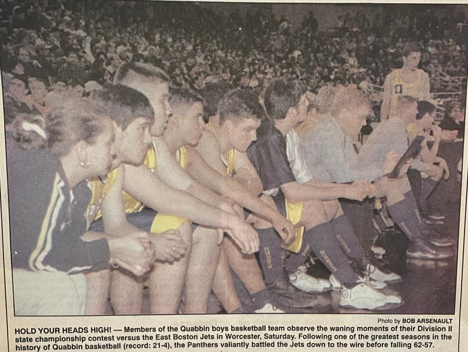 The Quabbin bench looks on in the final moments of their game against East Boston in the state championship in 1999. The former players were honored at a 25 year reunion celebration at a game on February 2, 2024.