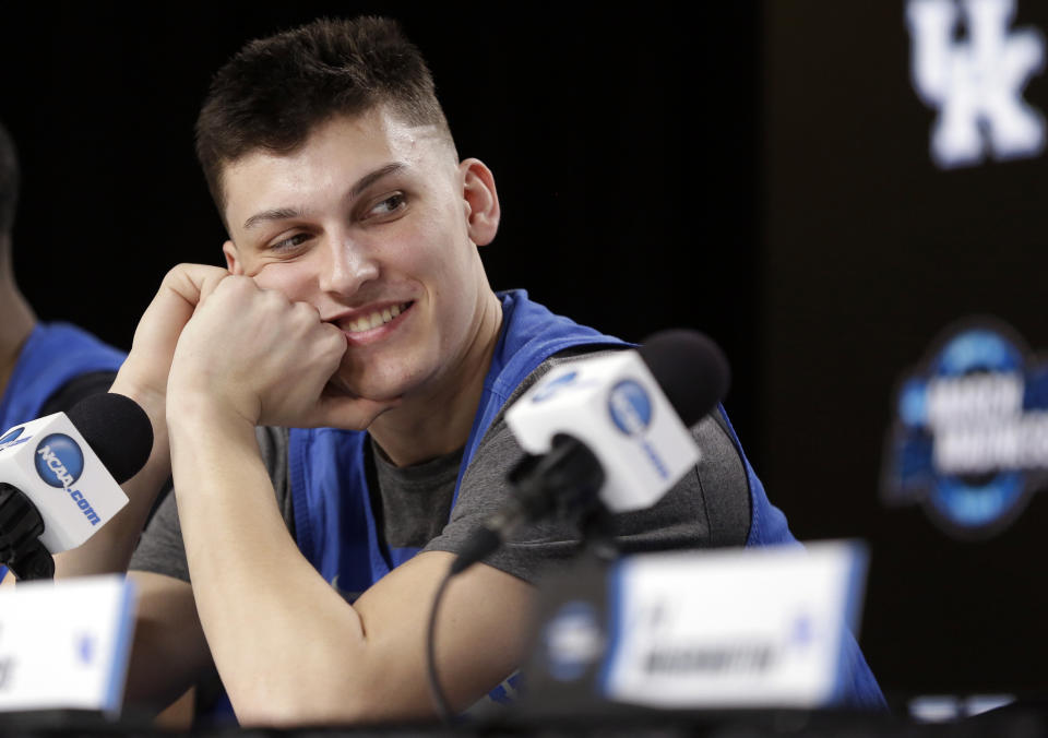 Kentucky's Tyler Herro looks over at head coach John Calipari during a news conference at the NCAA tournament college basketball tournament Saturday, March 30, 2019, in Kansas City, Mo. Kentucky is set to play Auburn in the Midwest regional final on Sunday. (AP Photo/Jeff Roberson)