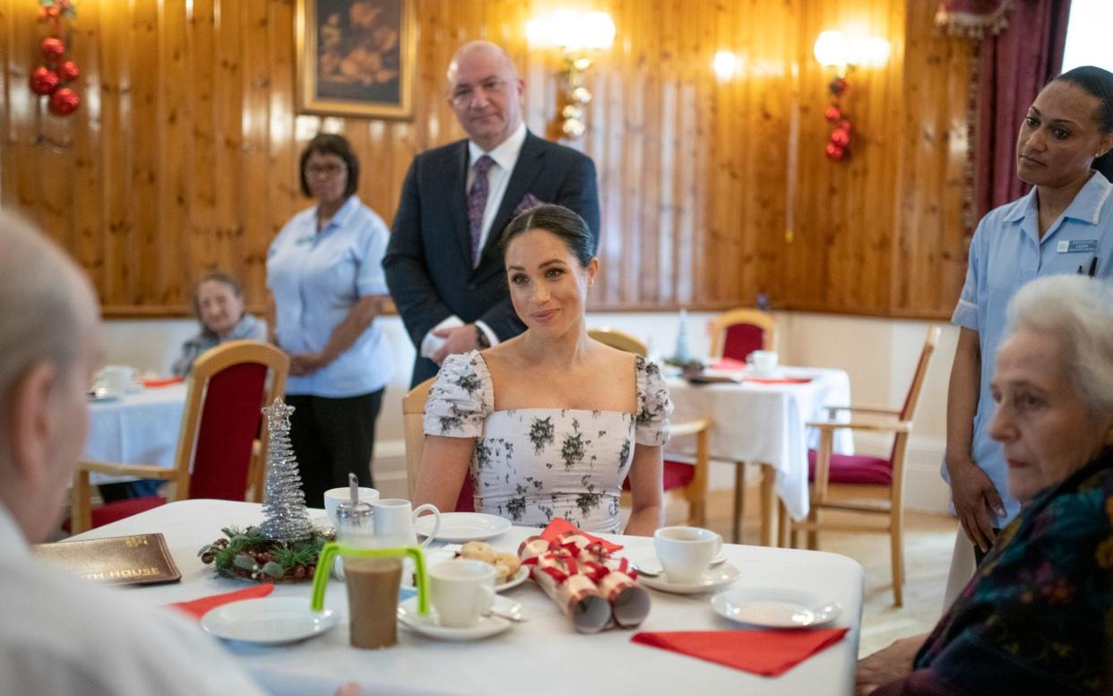 Meghan holding court with the pensioners  - Geoff Pugh